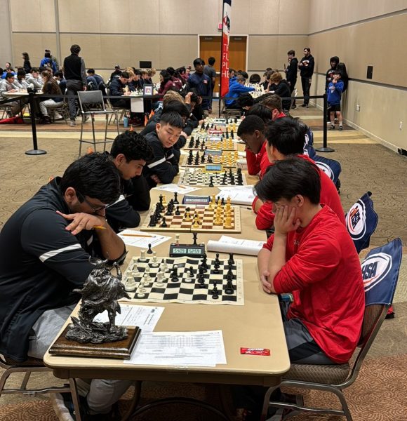 Centrals chess team (right) faces off with Fremd at the IHSA Chess State Championship on Feb. 10. Central lost the match, but ultimately finished sixth in the state.