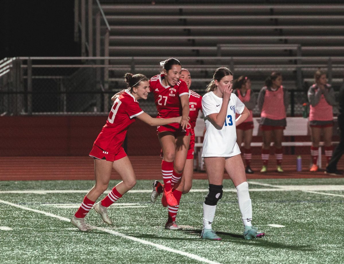 Sophomore forward Malia Shen (27) celebrates her second of two goals during Central’s 4-2 win over Burlington Central in their opening game on March 13.