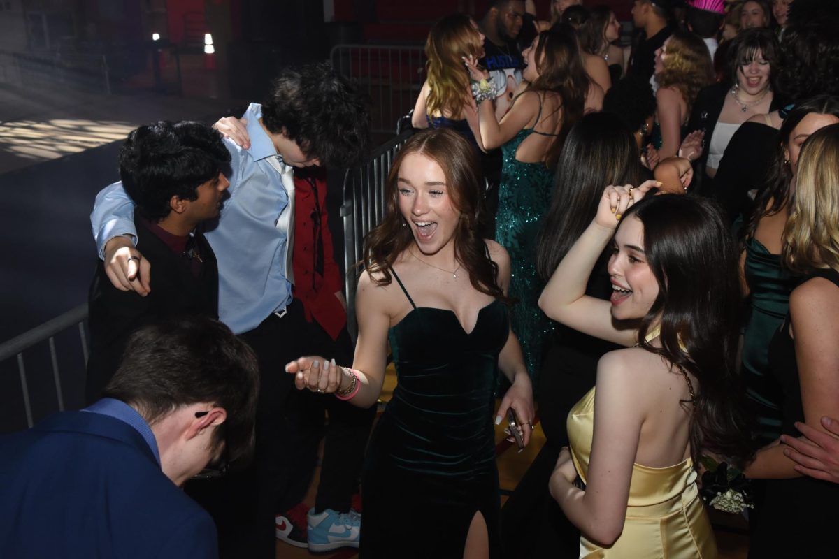 Sophomore Grace Siuda dances at Central’s Winter Dance on Feb. 10, 2024. The 2024 dance had the lowest attendance on record, despite several changes made to the event. (Photo Credit: Lifetouch)
