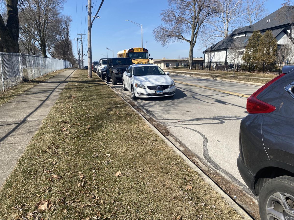 Depicted above is the treacherous area of parking at the end of Hillside Street which lacks guide lines for parallel parking.