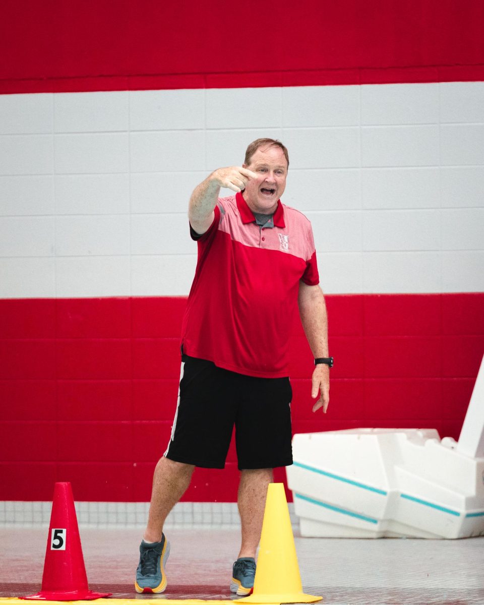 Varsity+boys+water+polo+coach+William+Salentine+directs+his+team+during+a+game+against+Barrington+on+April+18.+Sal+has+coached+the+team+for+23+years%2C+winning+over+80%25+of+his+games+in+that+time.
