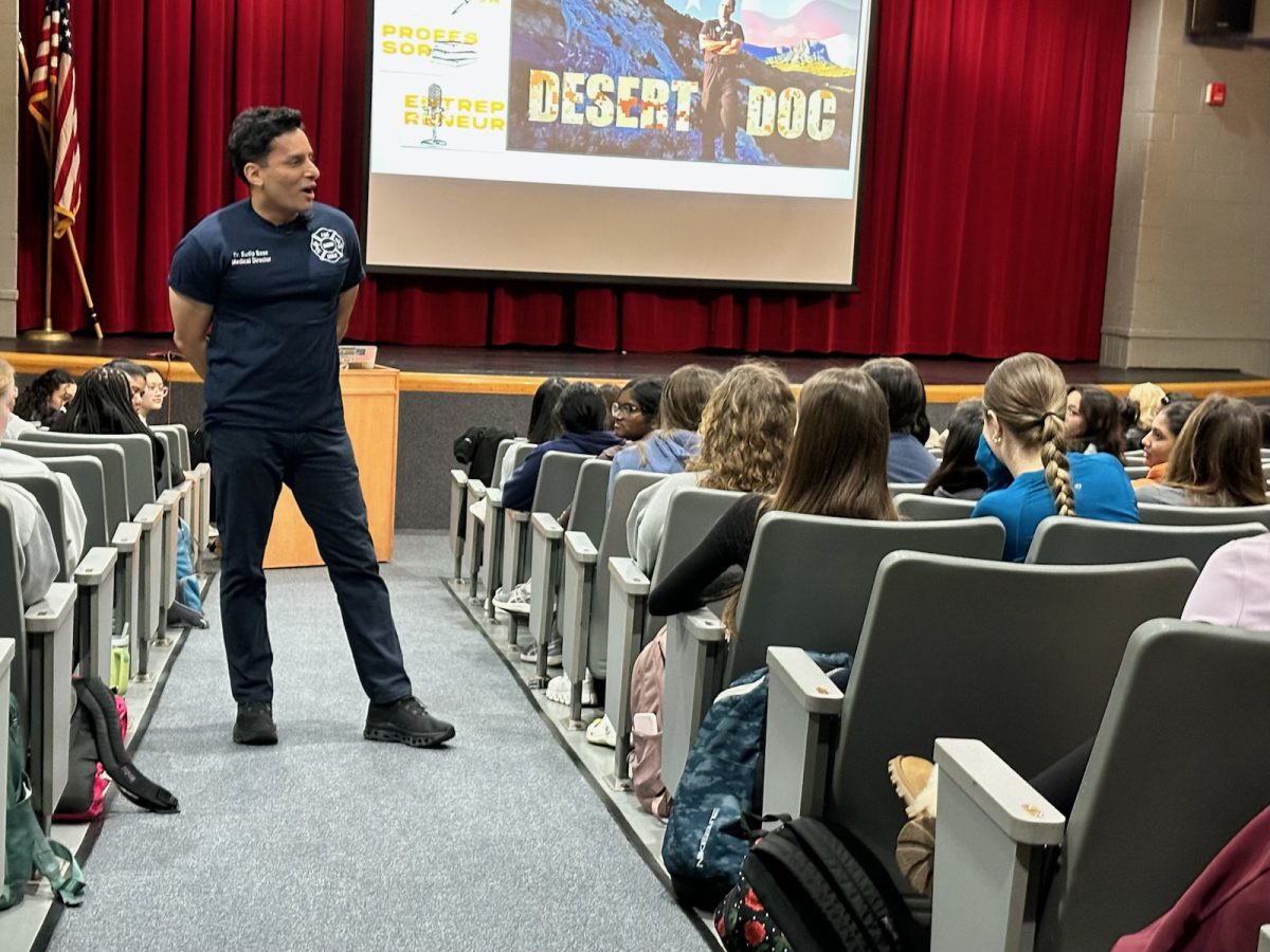 Dr. Sudip Bose talks to students in the Little Theater on April 22. Bose is a Central graduate and worked as a military medic in Iraq.