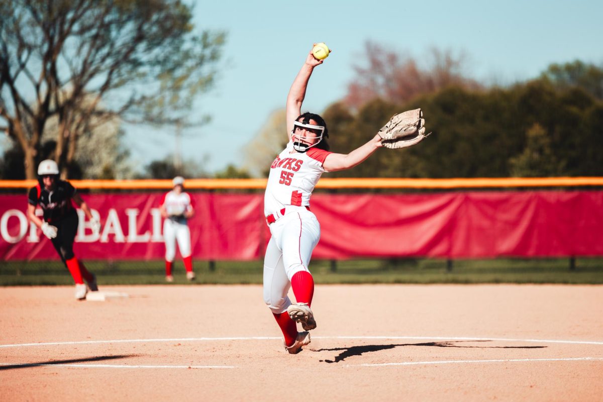 Freshman Avery Miller winds up for a pitch during a game against DeKalb on April 15. Central won the game 12-2.