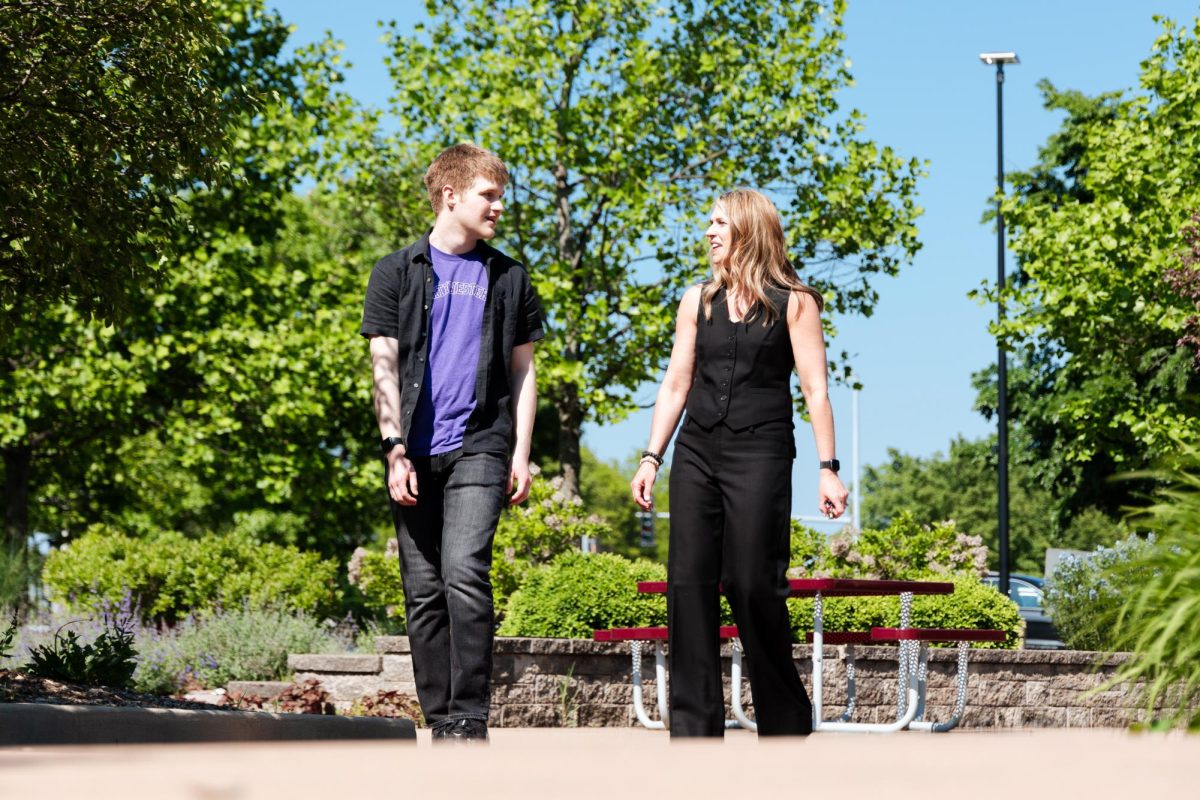 Senior Jake Pfeiffer and his mom, Principal Jackie Thornton, walk in Centrals honor garden on May 15. The two will share one last experience at Central when Pfeiffer walks across the graduation stage on May 19.