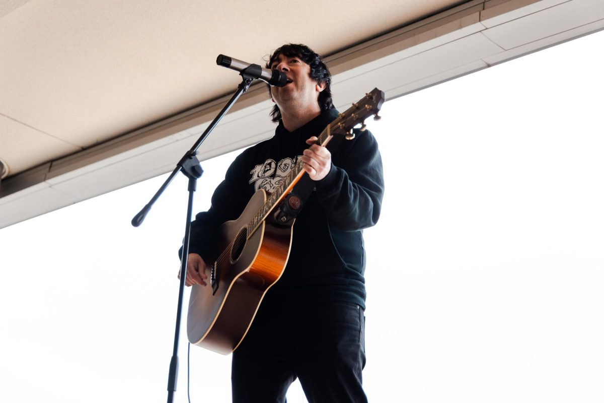 Tom Higgenson, lead singer of the rock band Plain White T's, performs a solo acoustic set at Central on May 9.
