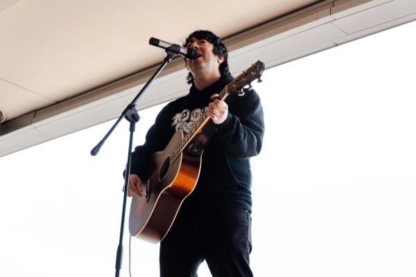 Tom Higgenson, lead singer of the rock band Plain White Ts, performs a solo acoustic set at Central on May 9.